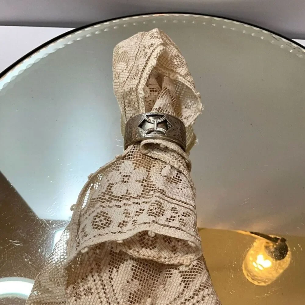Stunning Sterling silver vintage napkin ring; open work front must see